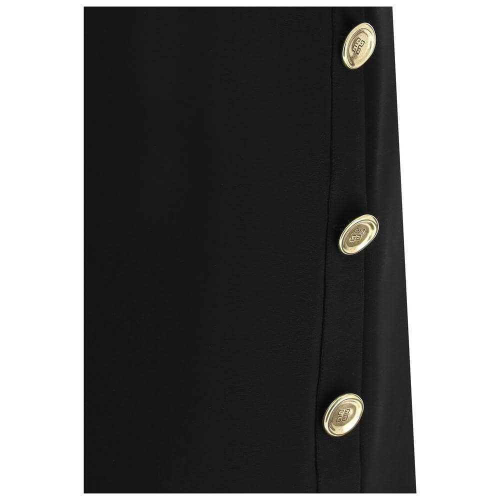 Black Givenchy dress with side button detail showcasing iconic brand logo applique.