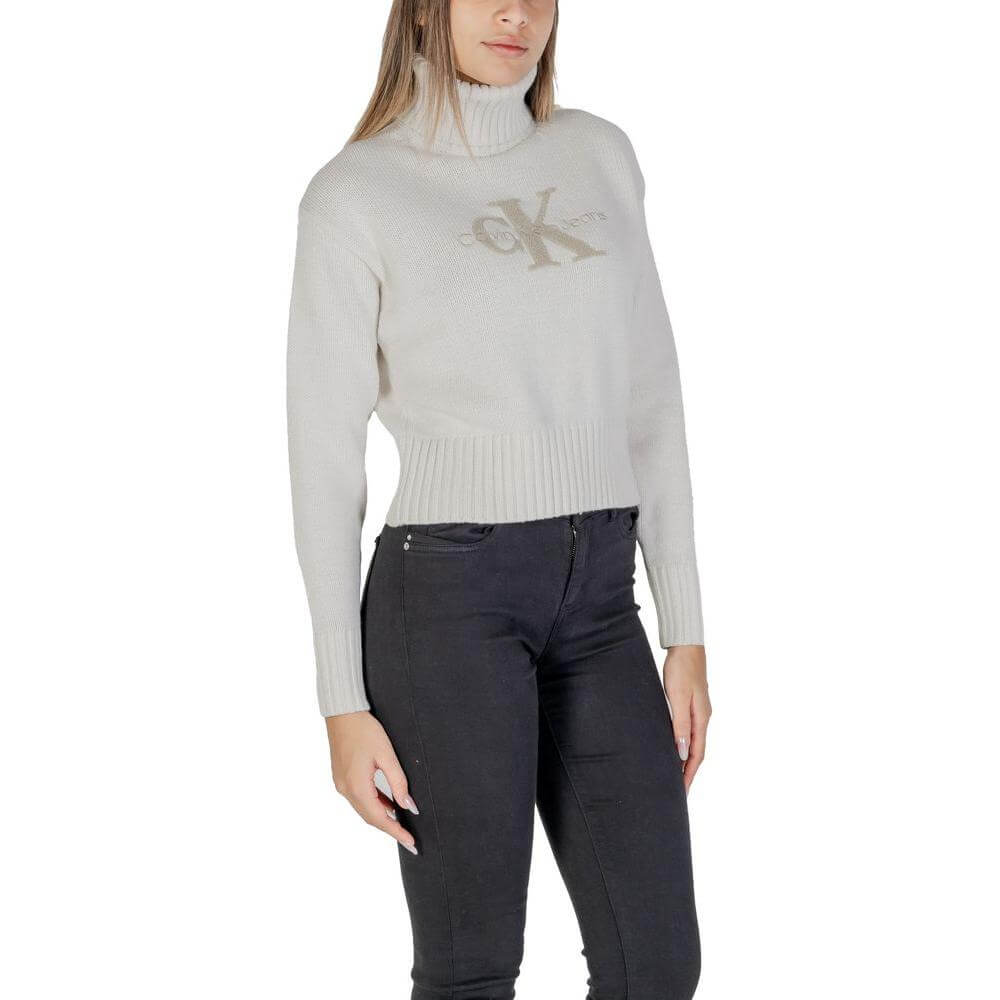 Calvin Klein Jeans cream cotton sweater for women, fall/winter knitwear, 60% cotton, 40% acrylic, stylish and cozy design.