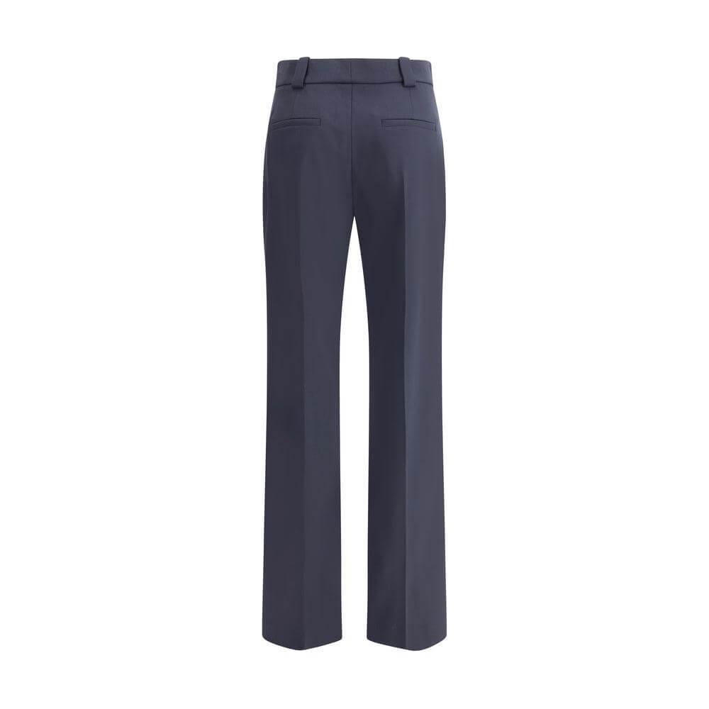 Back view of Chloé virgin wool pants with belt loops, zipper closure, and four slit pockets in a regular fit.