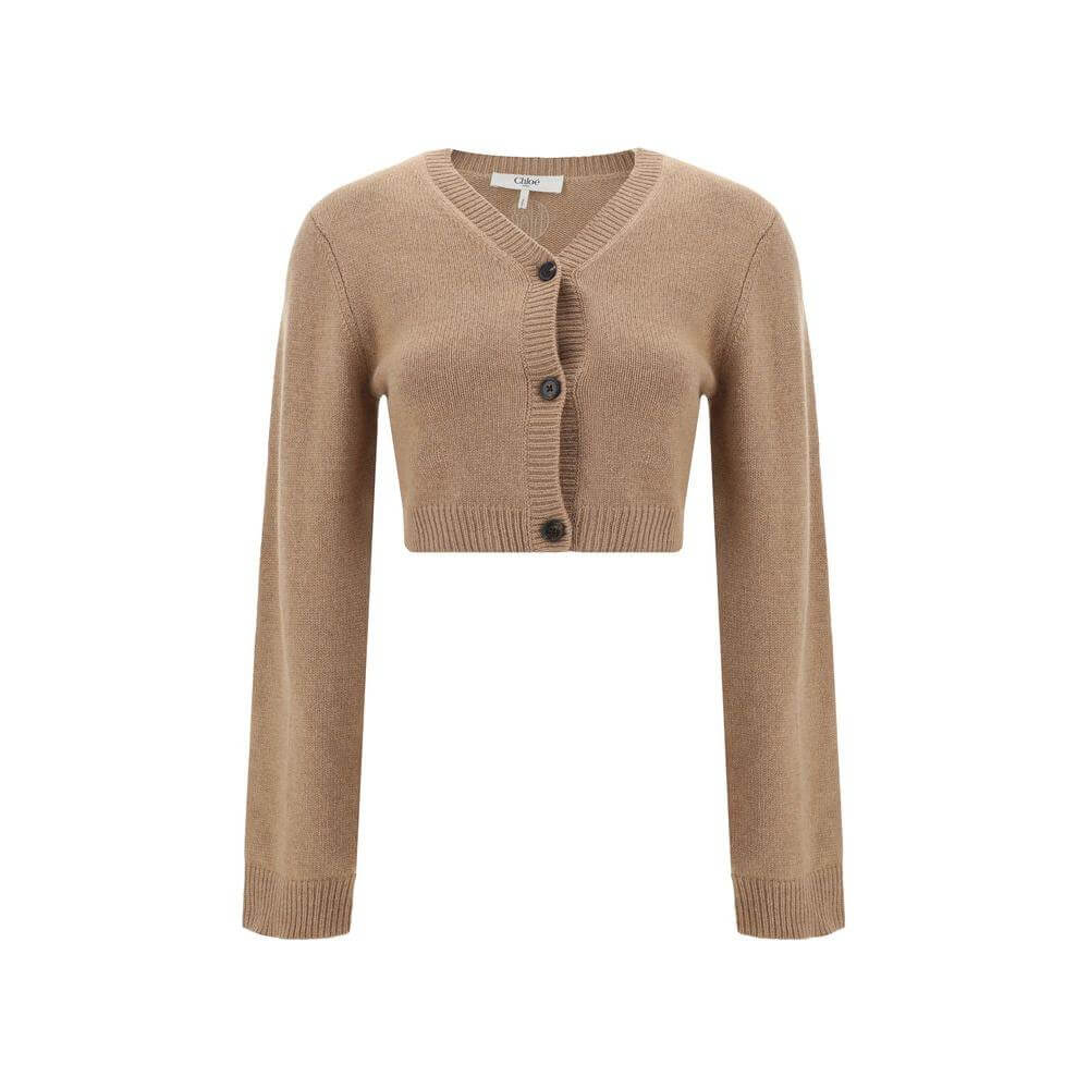Chloé cashmere cropped sweater with ribbed crew neck and contrasting buttons, featuring ribbed cuffs and hem in a monochrome pattern.