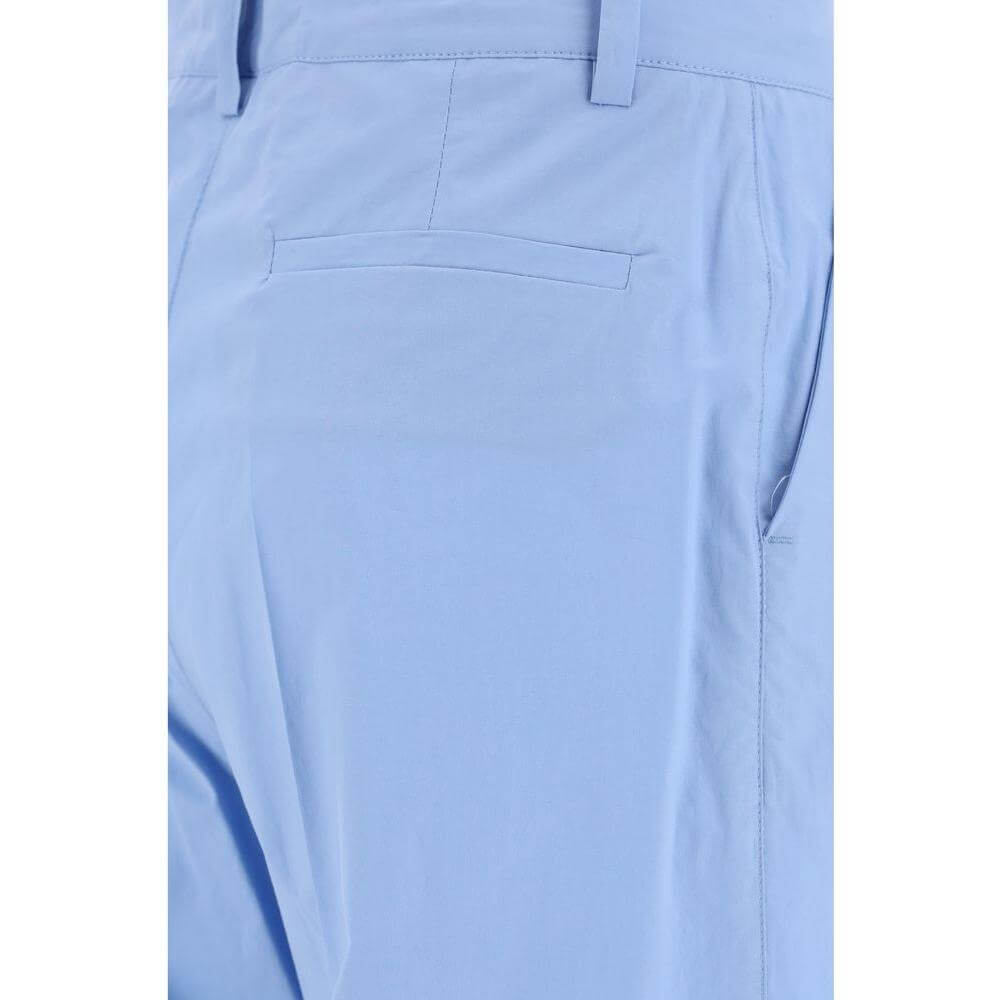Light blue P.A.R.O.S.H. cotton pants with back welt pocket detail and waistband loops.