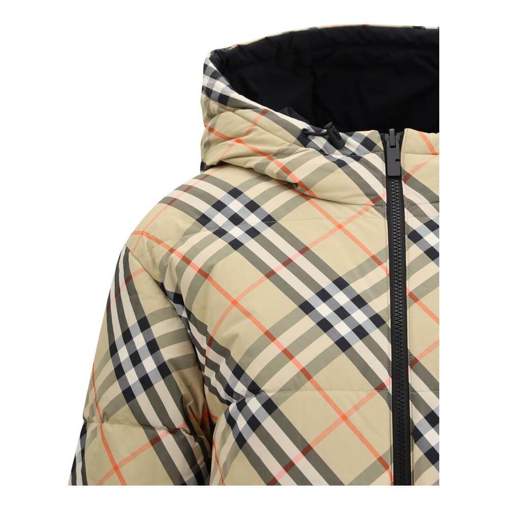 Burberry reversible down jacket with adjustable hood and iconic check pattern, featuring zip closure for style and functionality.
