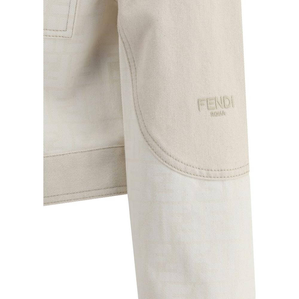 Close-up of Fendi FF print beige denim jacket sleeve with subtle logo detailing on fabric.