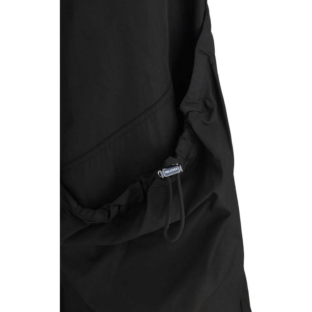 Close-up of The Attico Nylon Cargo Pants showcasing adjustable drawstring and side pocket detail in black.