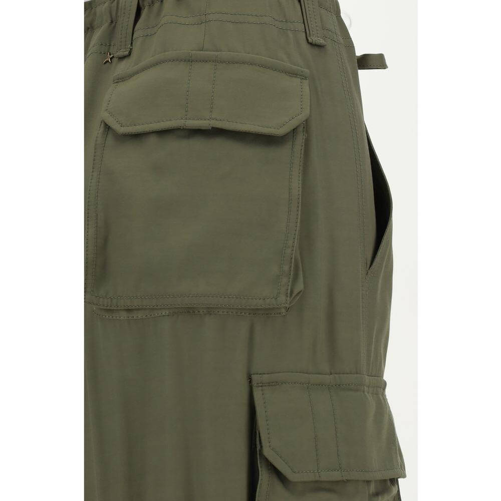 Close-up of olive green Golden Goose cargo pants with side cargo pockets and adjustable drawstring.
