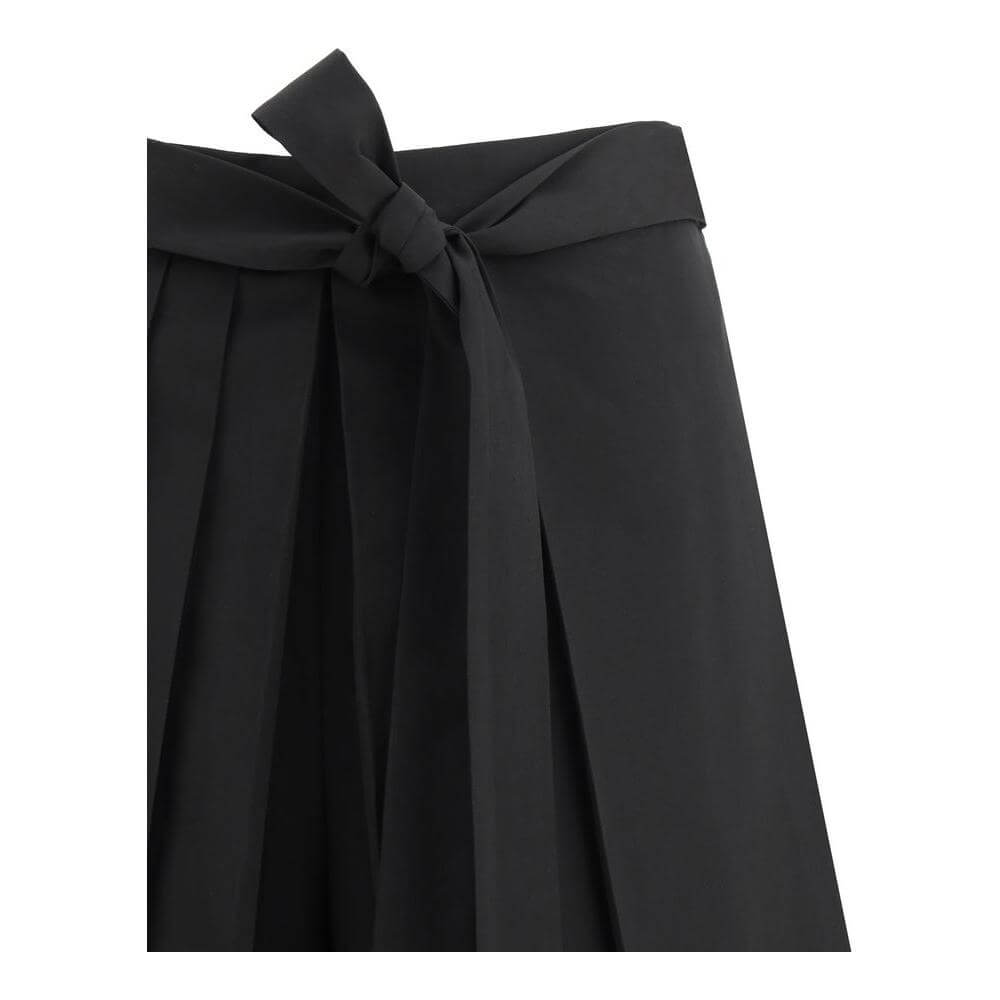 Fabiana Filippi relaxed fit pants with wide leg, pleats, and knotted sash detail in black fabric.