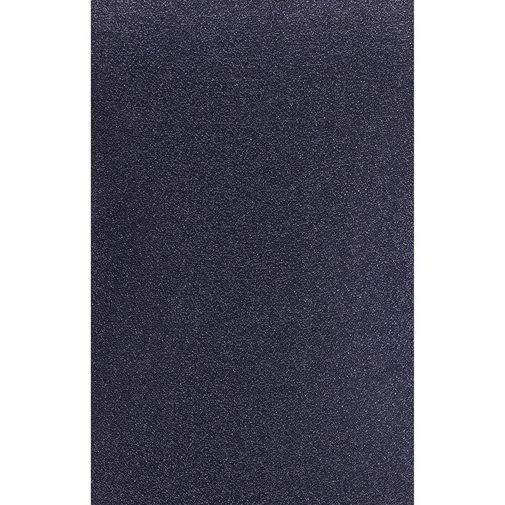 Close-up view of a dark textured surface resembling fine glitter, showcasing a monochrome and abstract pattern.
