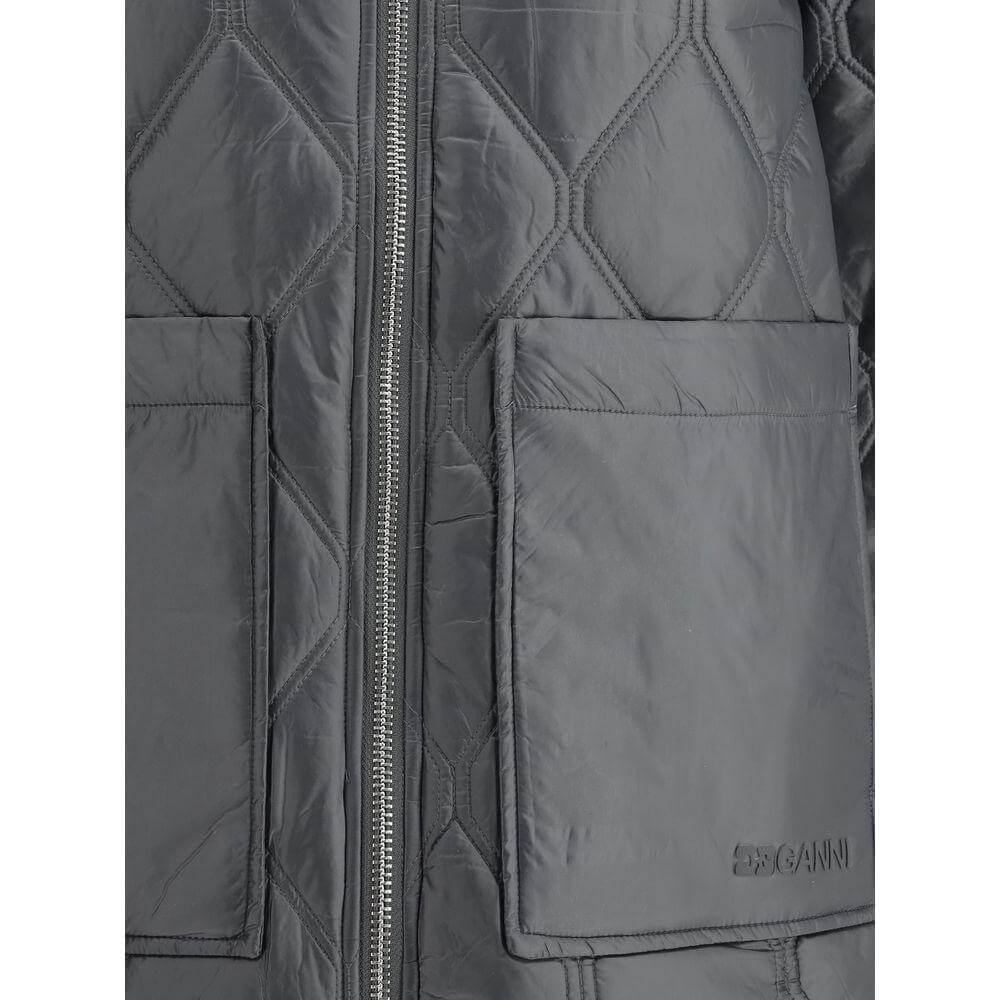 Ganni jacket featuring quilted design, front zipper closure, wide collar, and maxi welt patch pockets with tone-on-tone monogram detail.