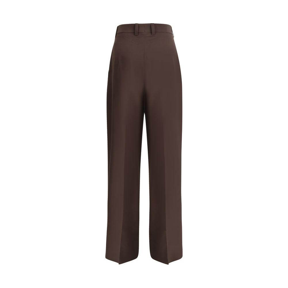 Petar Petrov high-waisted silk pants with wide-leg design, featuring hidden zipper, hook closure, and side welt pockets for elegance and comfort.