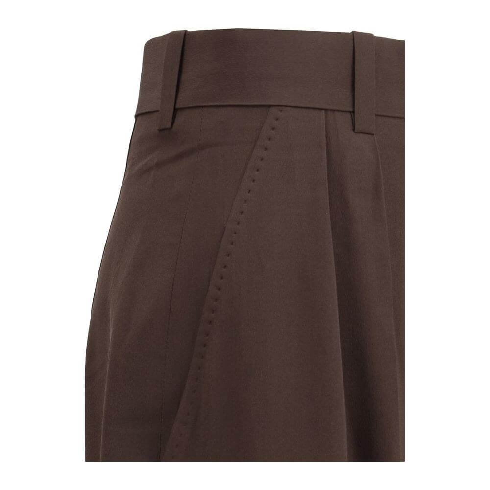 Petar Petrov high-waist silk pants with wide-leg design, featuring hidden front zipper and side welt pockets for style and functionality.