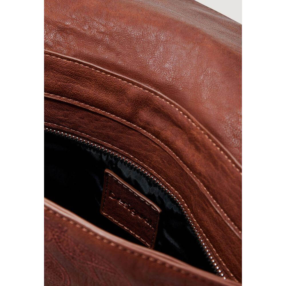Close-up of Desigual brown polyethylene handbag interior showing zipper detail from the Spring/Summer women's medium bags collection.