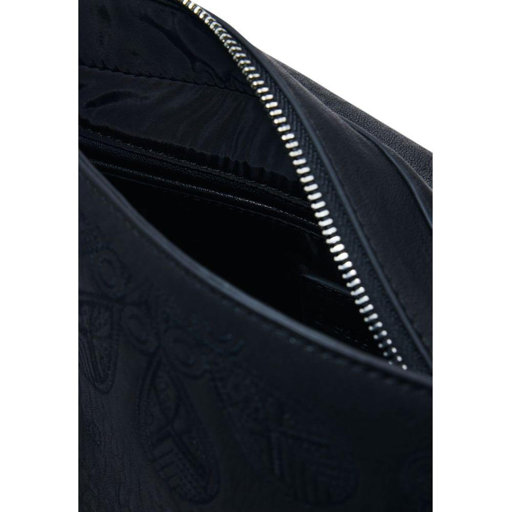 Open Desigual black polyethylene handbag showing interior lining and zipper detail, spring/summer collection, women's medium bag.