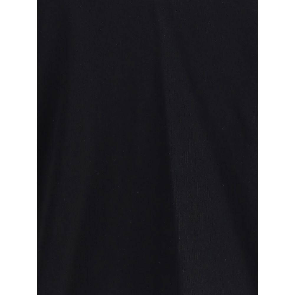 Close-up of black fabric texture of LouLou Studio's Telanto T-shirt with a minimalist tone-on-tone stitched logo detail.