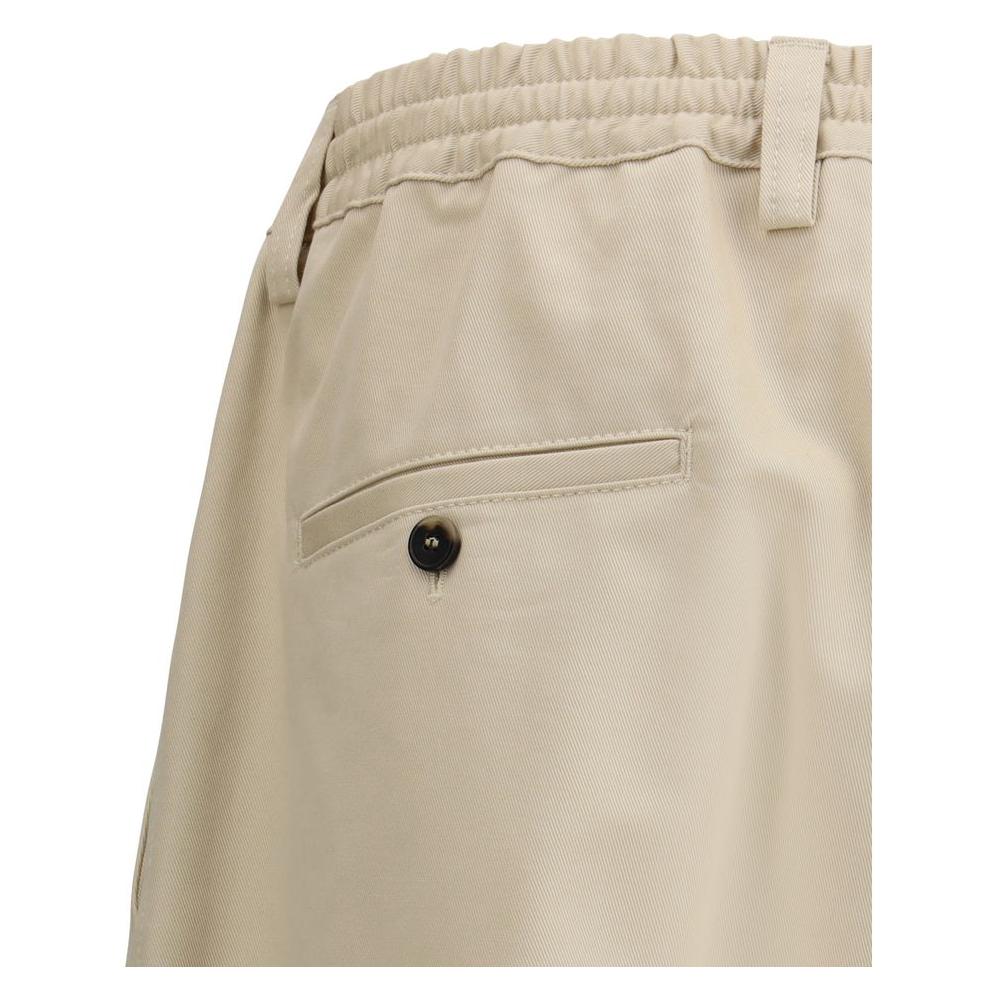 Marni cropped pants with elasticated waistband, side welt and back slit pockets, showcasing front zipper and button closure for versatile wear.