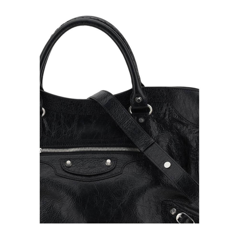 Balenciaga Le City Medium Handbag in black lambskin leather with adjustable shoulder strap, featuring elegant brass hardware.