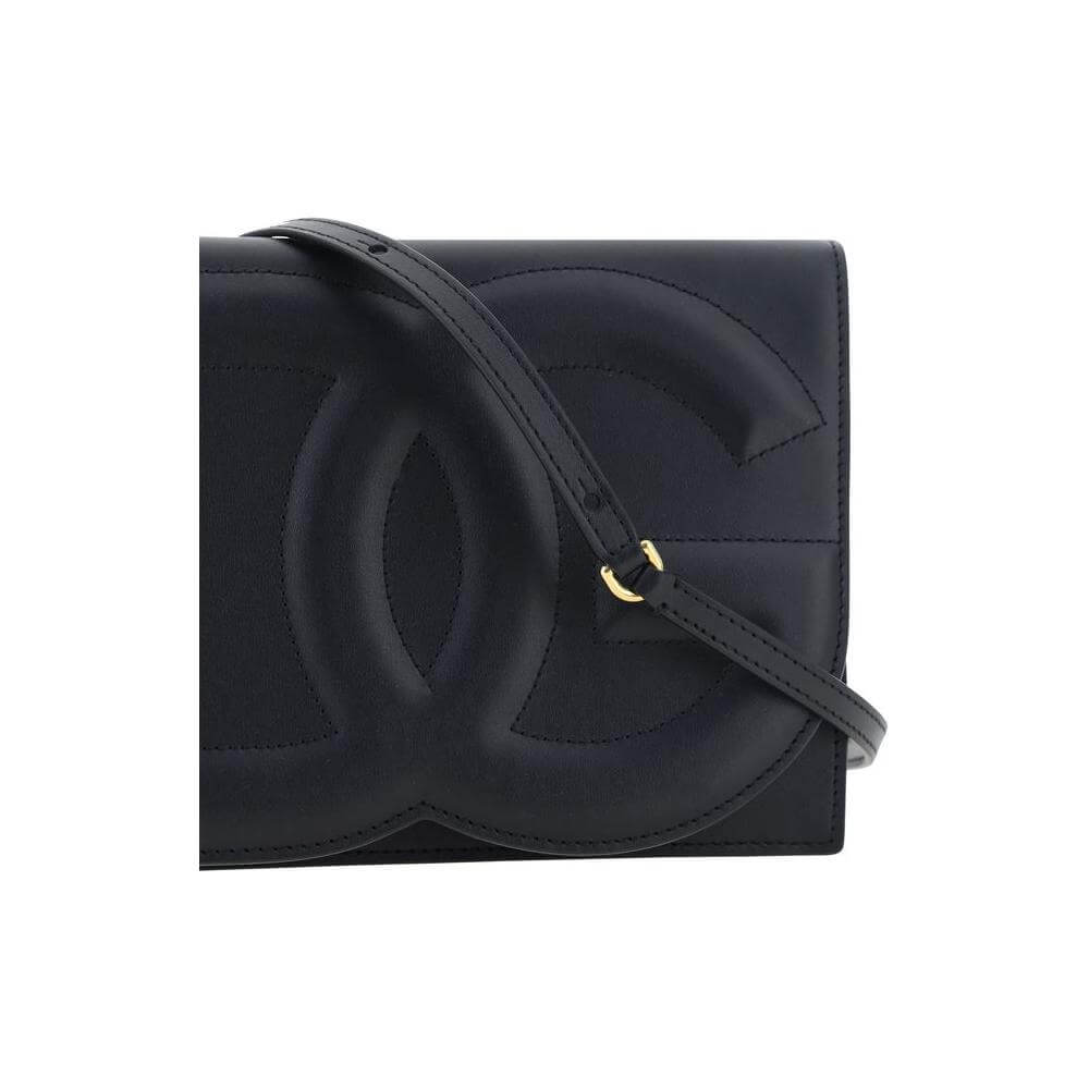 Dolce & Gabbana calfskin shoulder bag with maxi logo, tone-on-tone topstitching, magnetic flap, and leather strap.