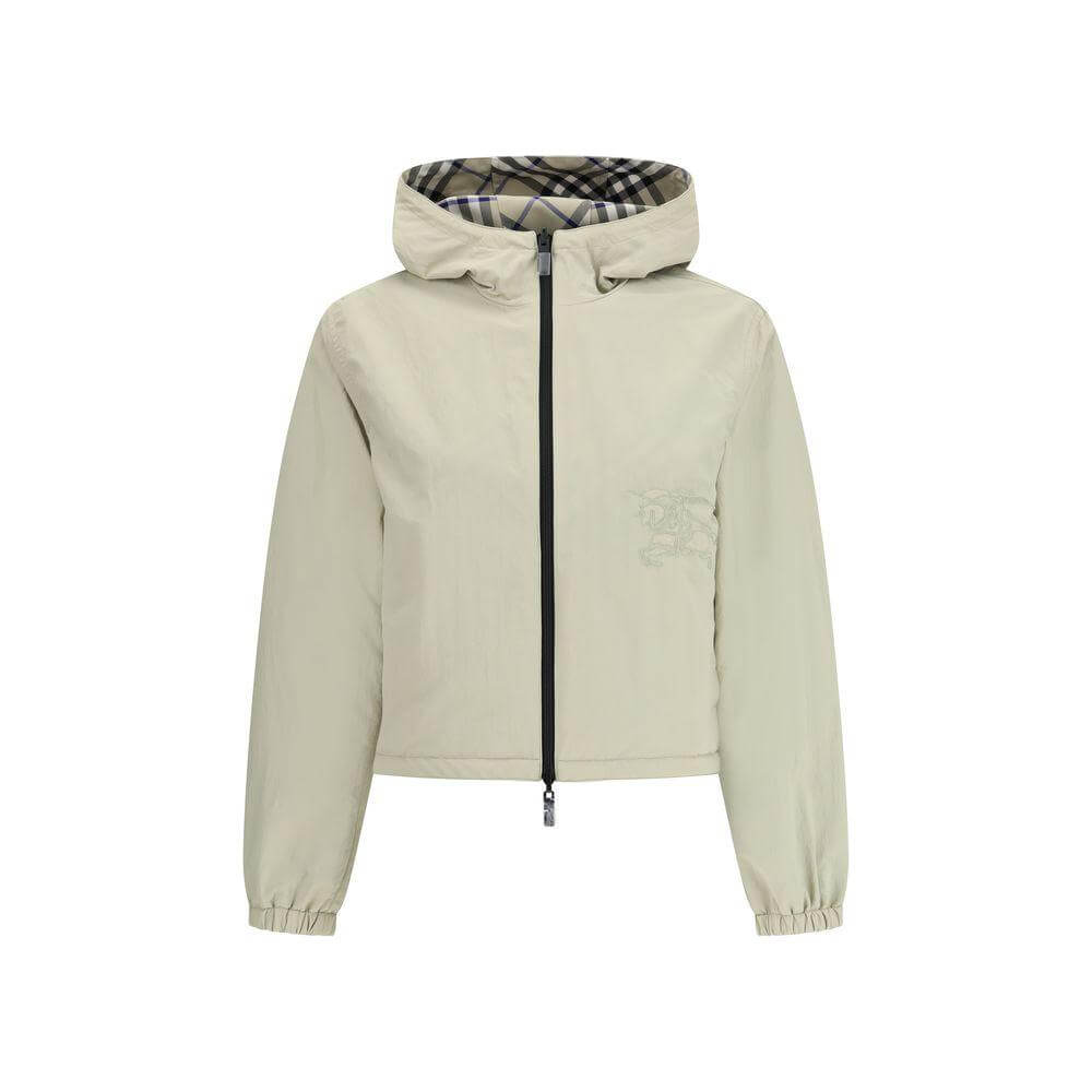 Burberry reversible jacket with adjustable hood, featuring monochrome and Check Archivio patterns, elastic cuffs, and zippered pockets.