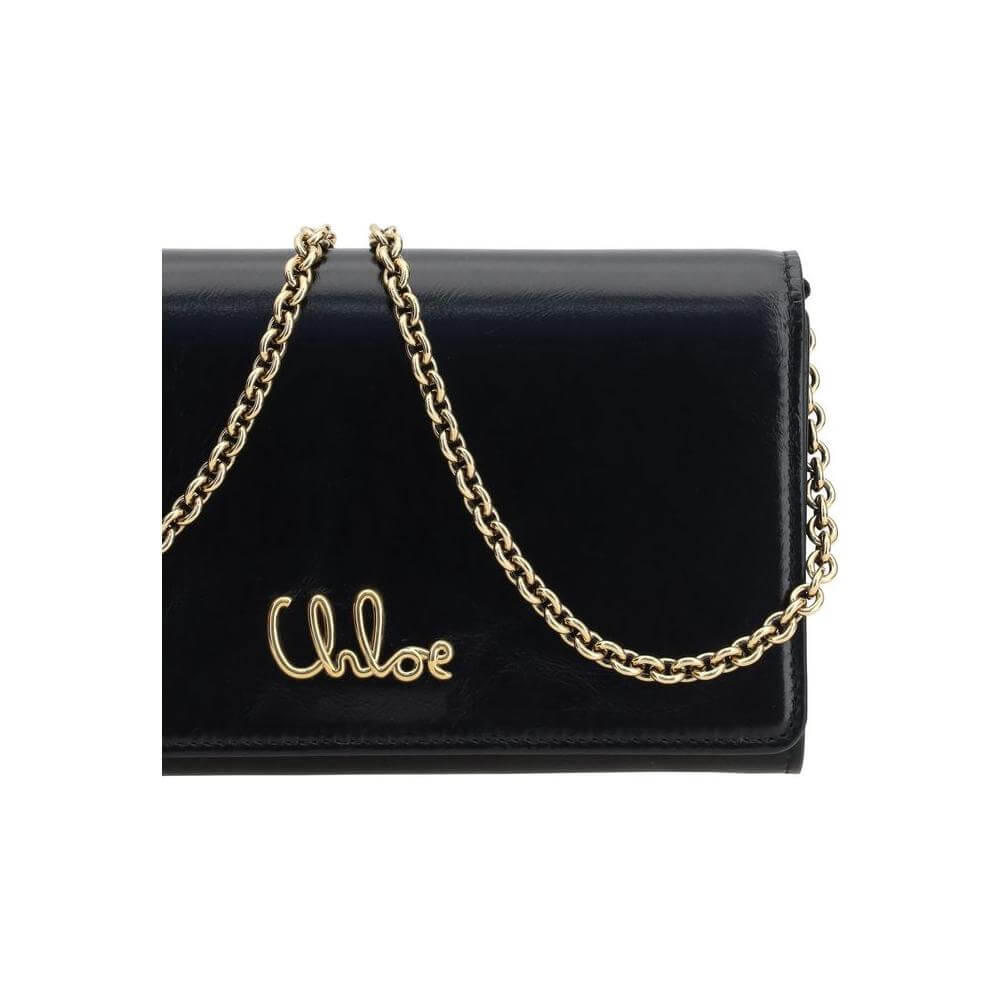 Chloé Iconic Pochette with gold chain strap and magnetic flap, showing luxury design and versatility for clutch or shoulder wear.