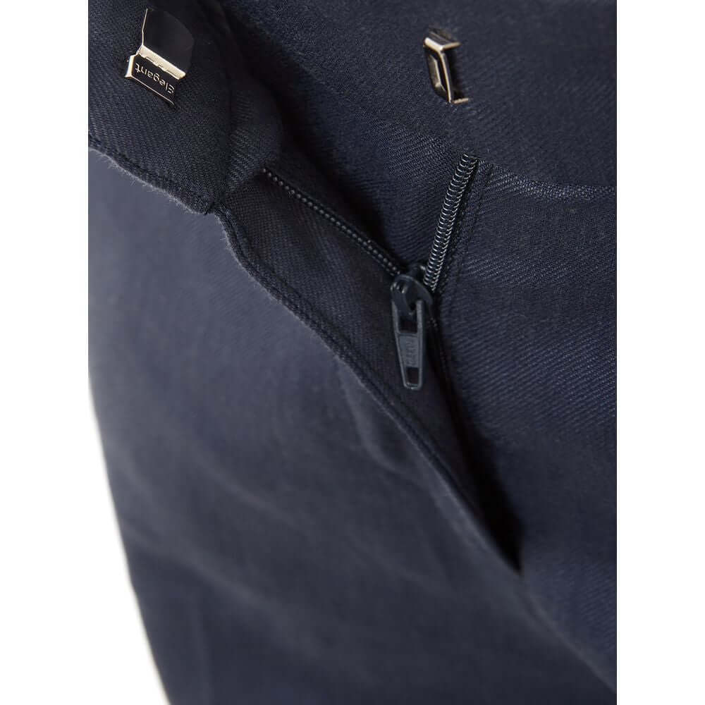 Close-up of Lardini chic blue linen trousers zipper detail, showcasing Italian craftsmanship and sleek design.