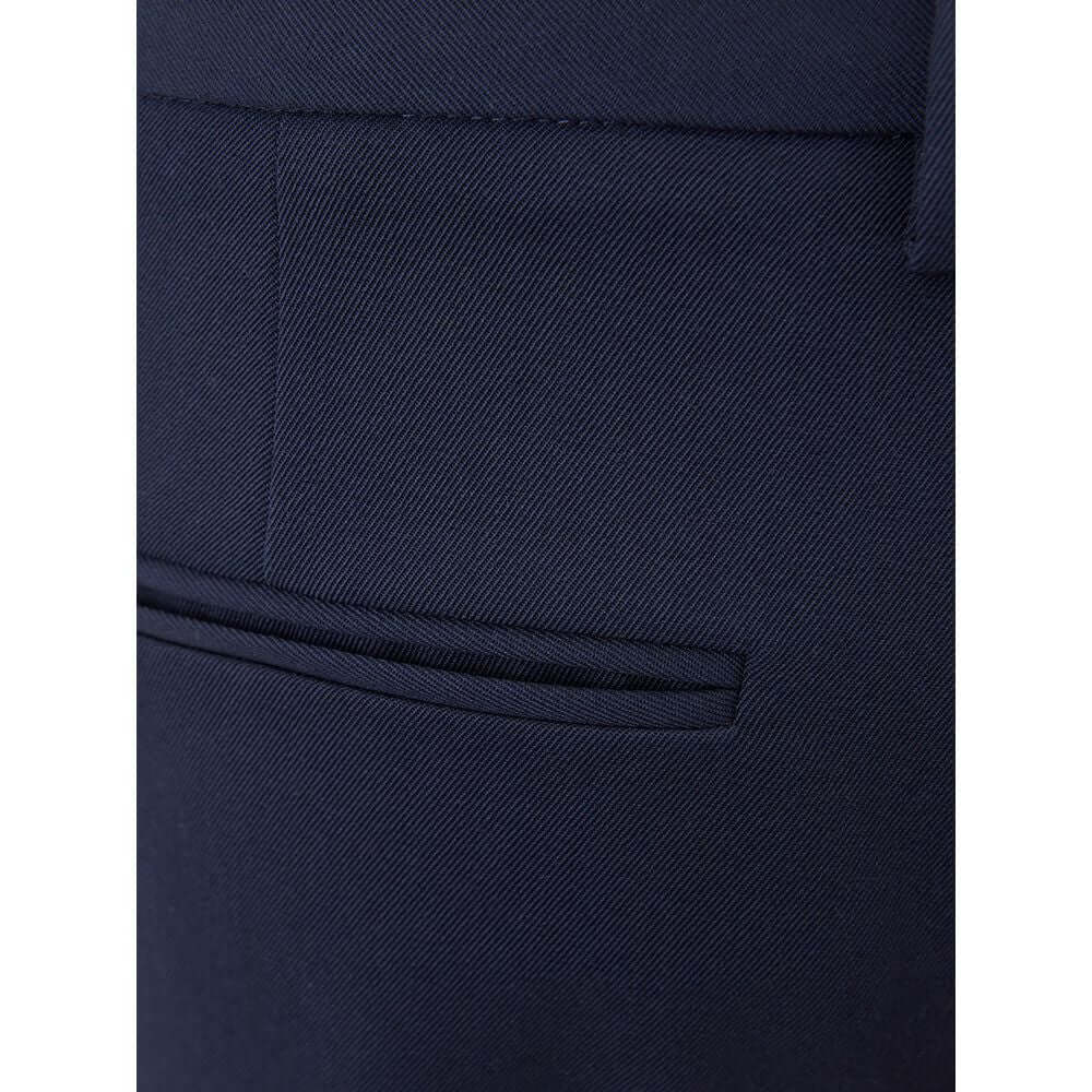 Close-up of back pocket on Lardini blue wool pants for women, showcasing Italian craftsmanship and tailored elegance.