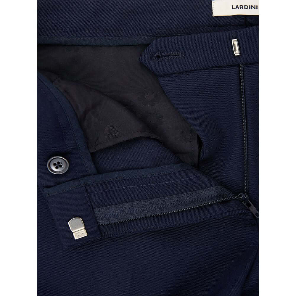 Close-up of Lardini elegant blue wool pants for women showcasing button and zipper details, Italian craftsmanship.