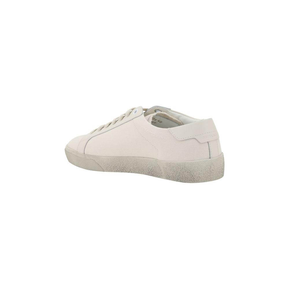 Side view of Saint Laurent SL06 Signa Sneakers with flat sole and iconic monogram, showcasing minimalist design and elegance.