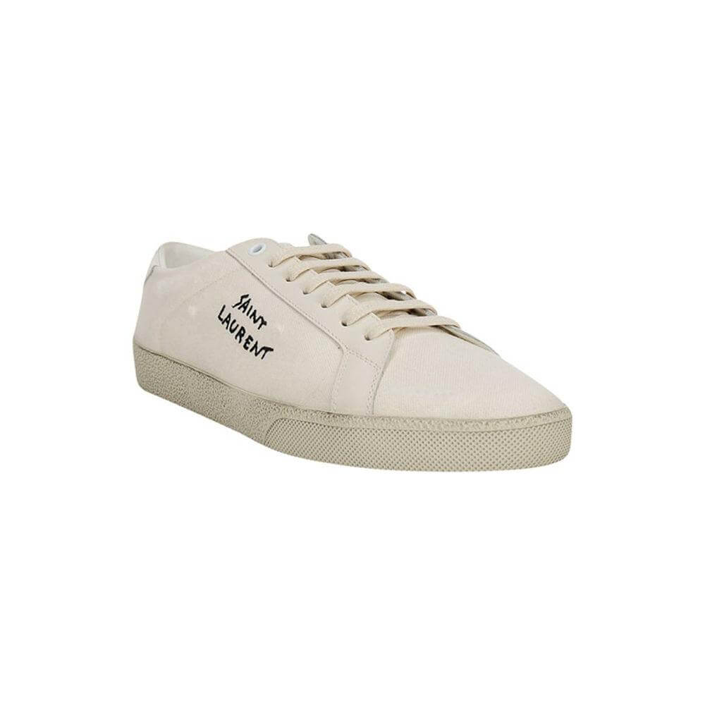 Saint Laurent SL06 Signa Sneakers in beige with brand monogram on side and lace-up closure, featuring a durable flat crater sole.