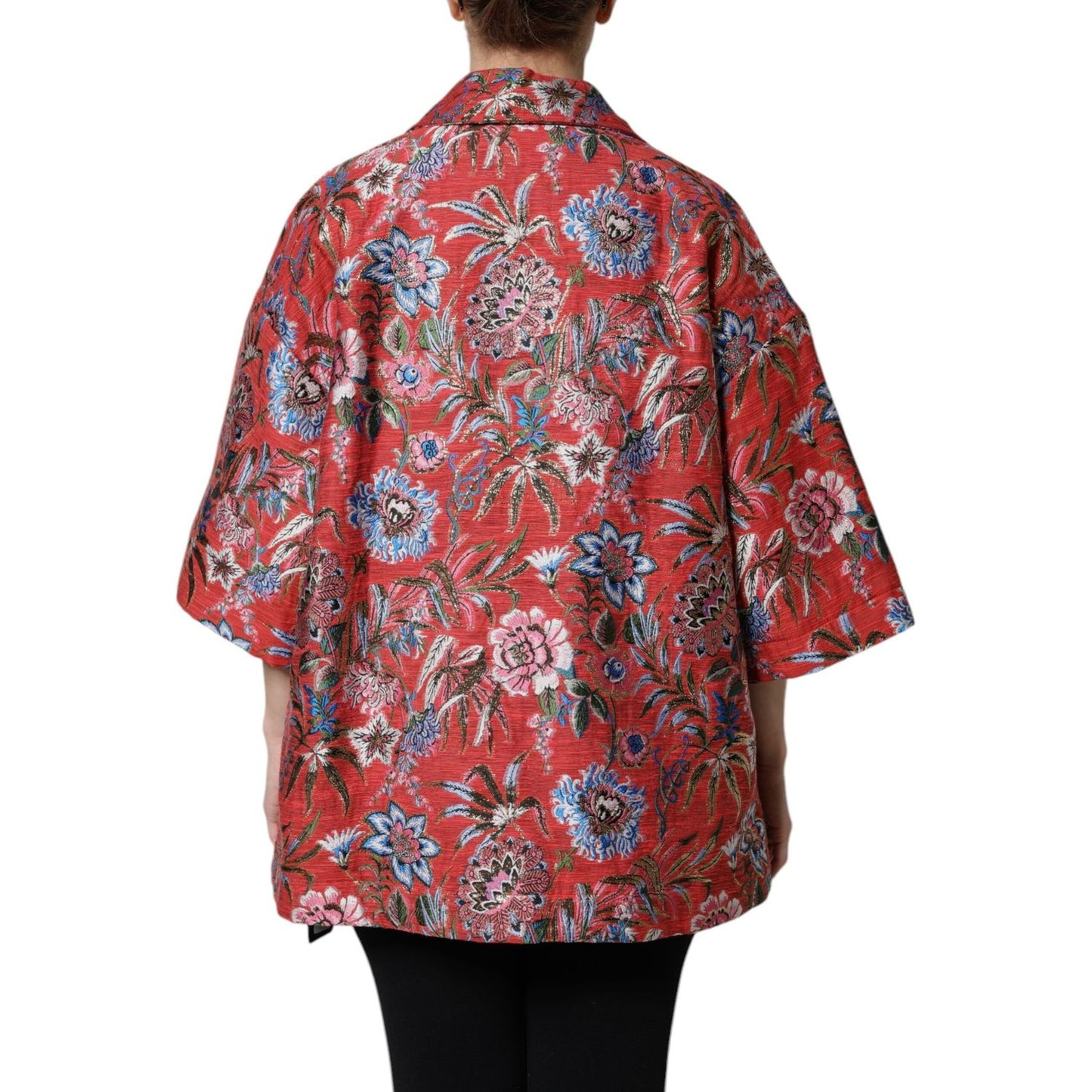 Back view of Dolce & Gabbana red floral jacquard button-down coat jacket with 3/4 sleeves showcasing intricate design pattern.