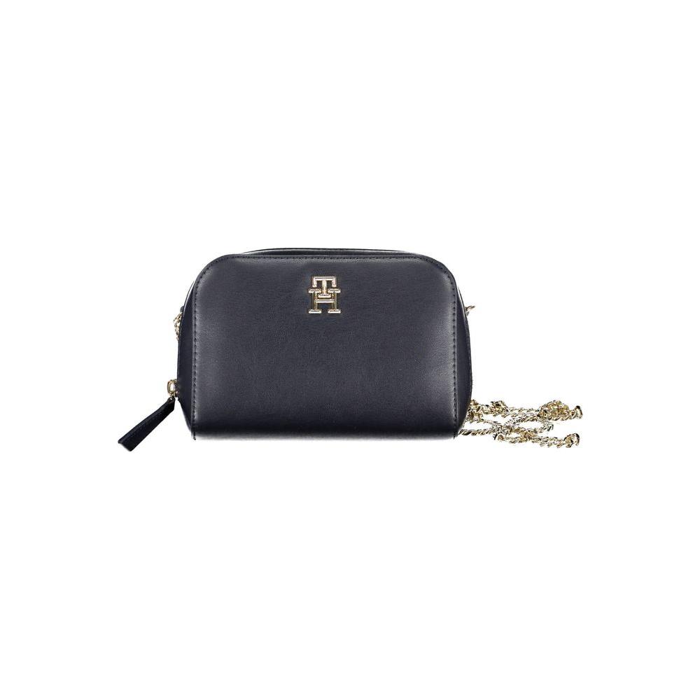 Tommy Hilfiger blue polyethylene handbag with chain shoulder straps, external and internal pockets, zip closure, and logo detail.