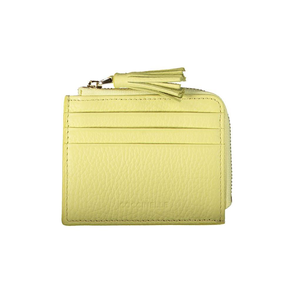 Coccinelle yellow leather wallet with card holder, central pocket, double card spaces, logo, and a tassel zipper.