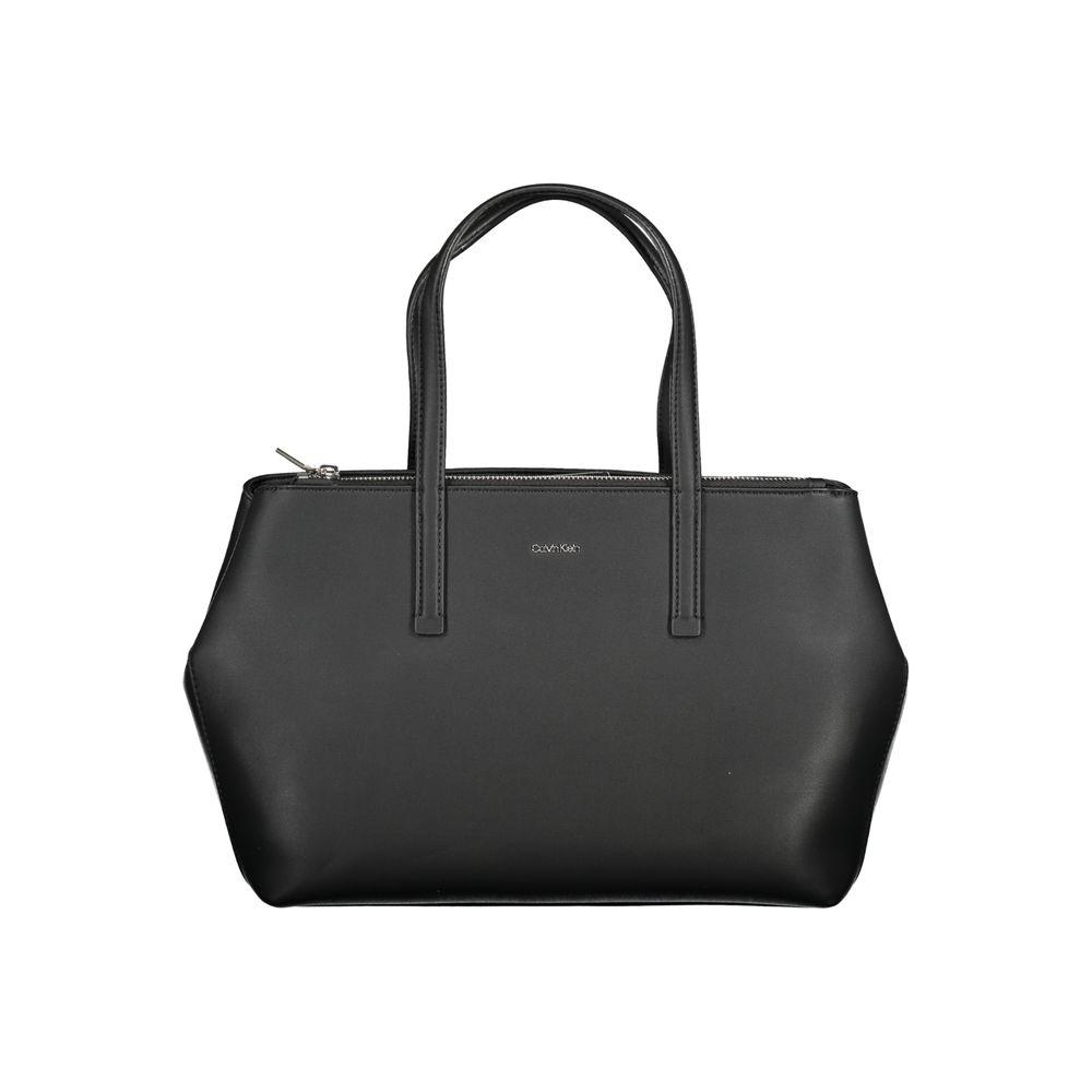 Calvin Klein black handbag with two handles, adjustable strap, external pocket, recycled polyester material, and logo detail.