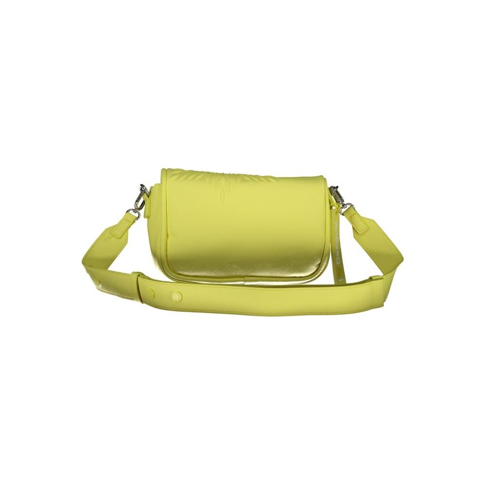 Desigual yellow polyethylene handbag with adjustable shoulder strap, internal pocket, contrast details, zip, and magnet closure.