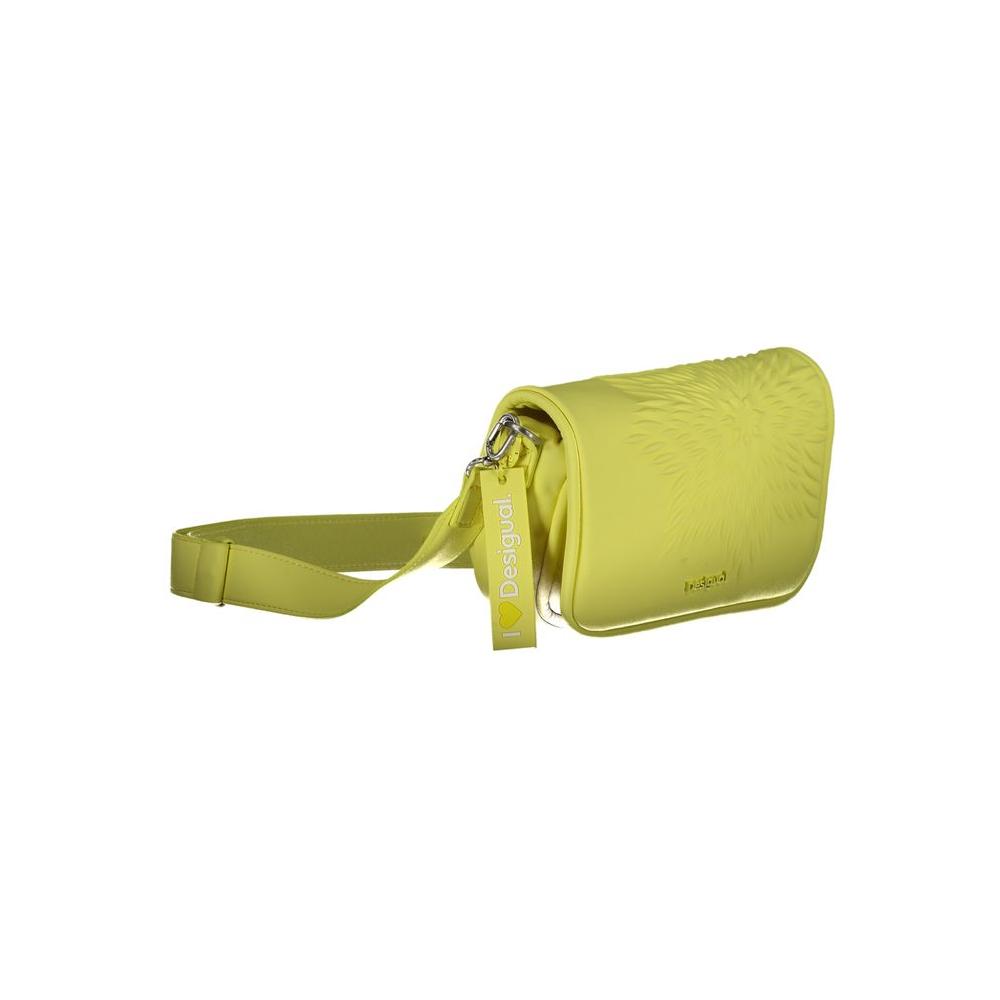 Desigual yellow polyethylene handbag with adjustable shoulder strap, internal pocket, zip and magnet closure, and contrasting details.