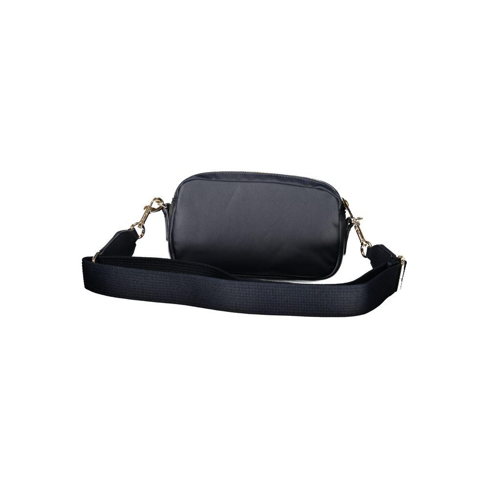 Tommy Hilfiger blue polyester women's handbag with adjustable strap, featuring two compartments and internal pocket.