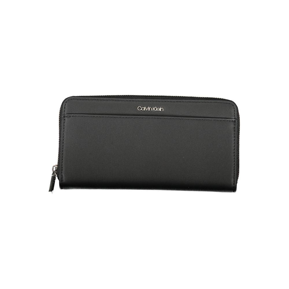 Calvin Klein elegant black RFID secure wallet with compartments, featuring a sleek design and crafted for sustainability.