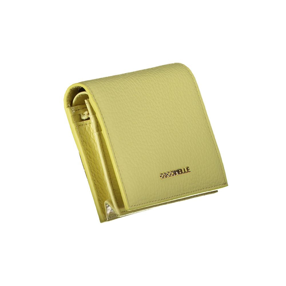 Coccinelle yellow leather wallet with logo, featuring two compartments, coin purse, and card spaces.