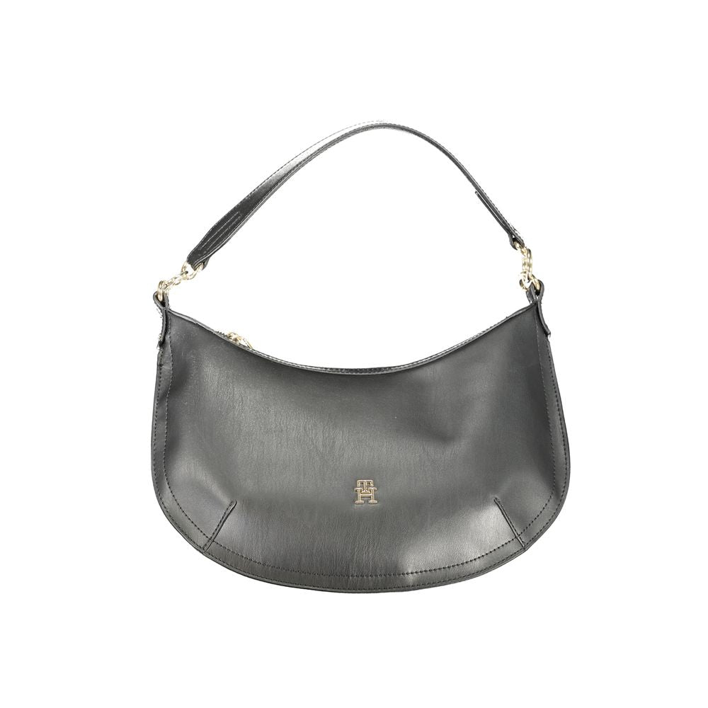 Tommy Hilfiger Black Handbag with shoulder handle, adjustable strap, internal pockets, and logo.