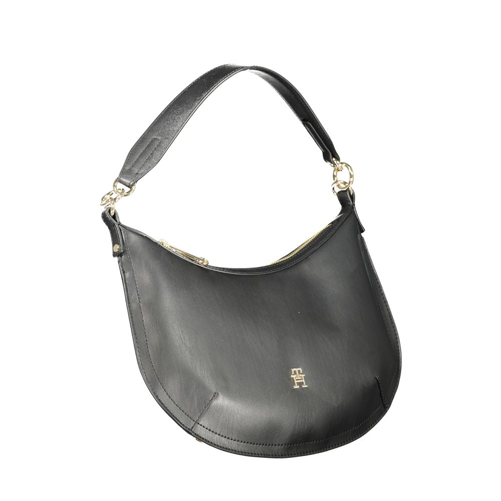 Tommy Hilfiger black polyethylene handbag with removable shoulder handle and strap, internal pockets, zip closure, logo detail.
