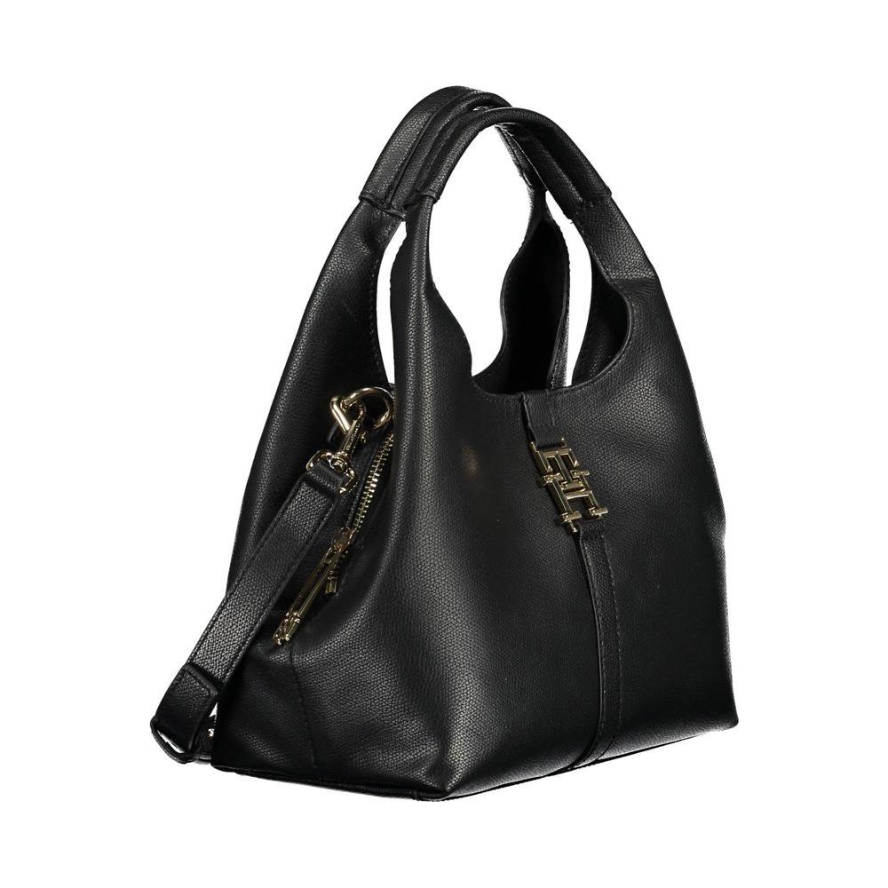 Tommy Hilfiger black polyethylene women's handbag with adjustable straps and zip closure, showcasing classic American fashion.