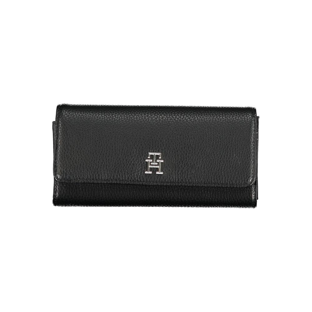 Tommy Hilfiger Elegant Quadruple Compartment Wallet with logo, featuring triple card slots and dedicated coin purse in sleek black design