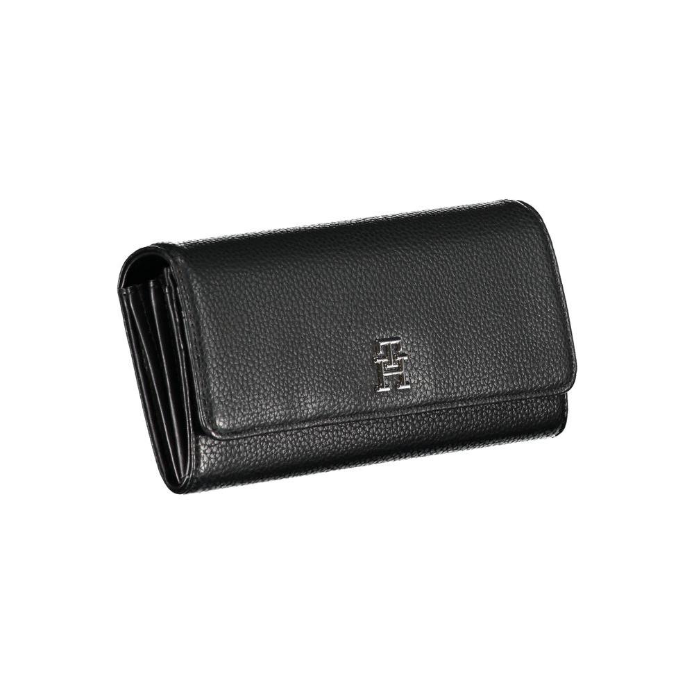 Tommy Hilfiger elegant wallet with quadruple compartments and chic logo, featuring card slots, coin purse, and secured closure.