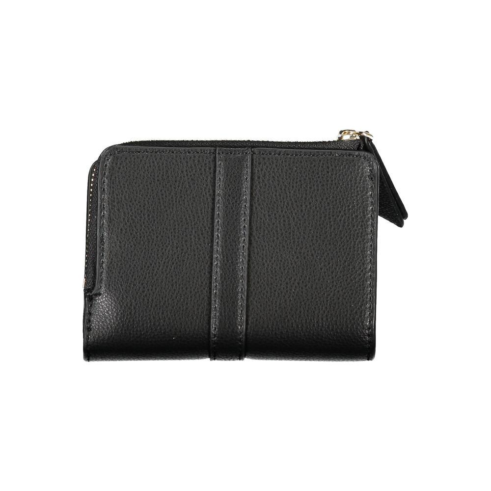 Sleek black Tommy Hilfiger zip wallet with coin purse, featuring compartments for cards and essentials. Made from recycled polyester.
