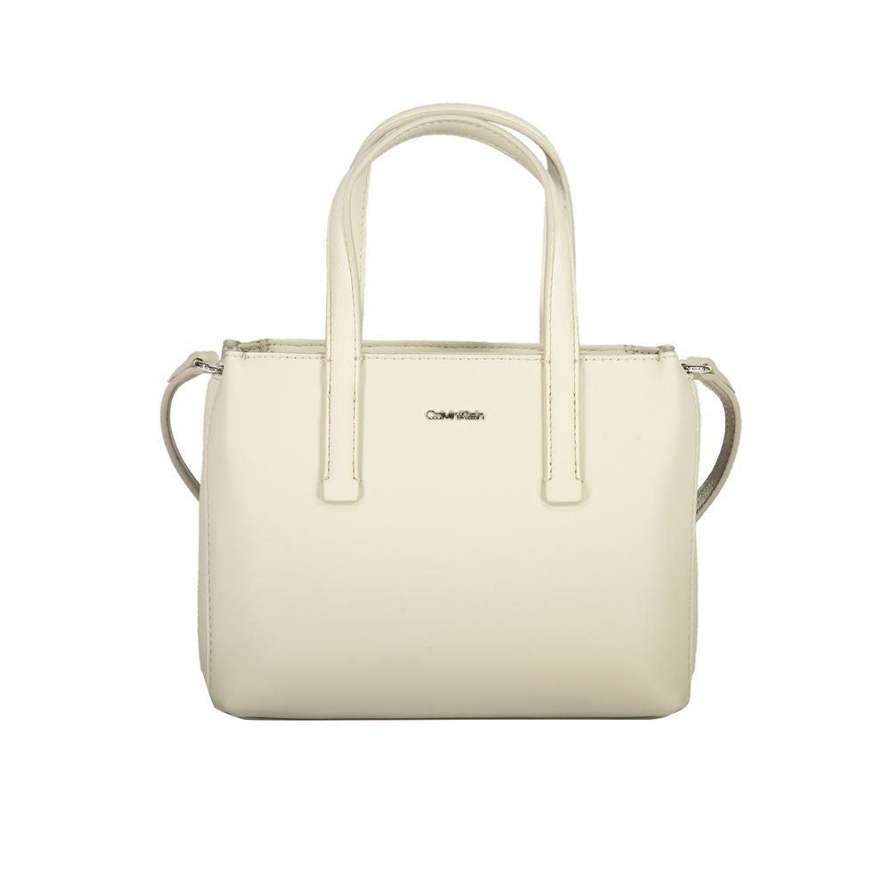 Calvin Klein beige polyester handbag with two handles, adjustable shoulder strap, internal card pocket, and zip closure