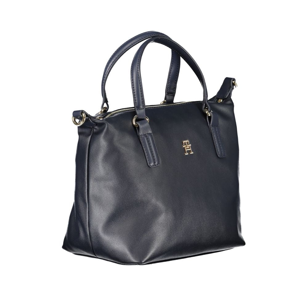 Tommy Hilfiger blue polyester handbag with dual handles, adjustable removable strap, internal pocket, and zip closure
