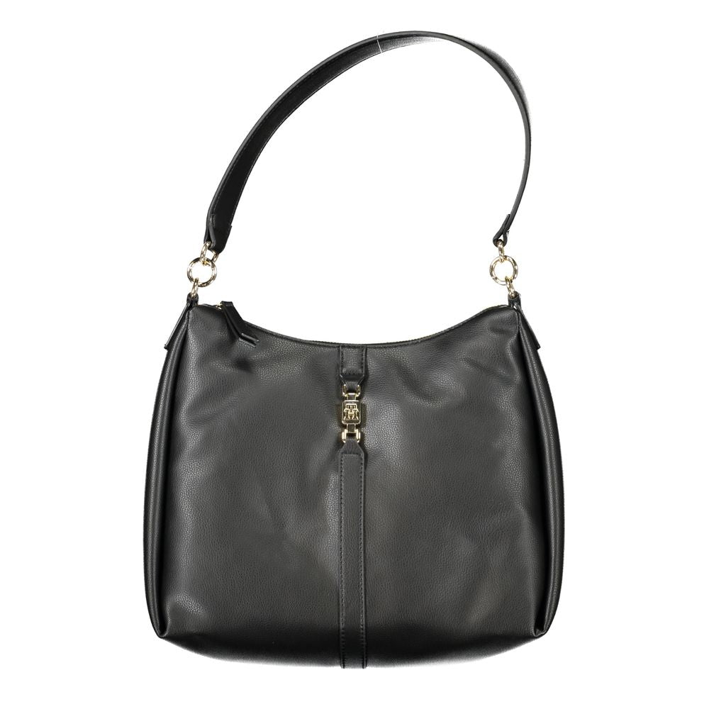 Tommy Hilfiger black polyester handbag with shoulder handle, internal pocket, contrast details, and zip closure; eco-friendly design.