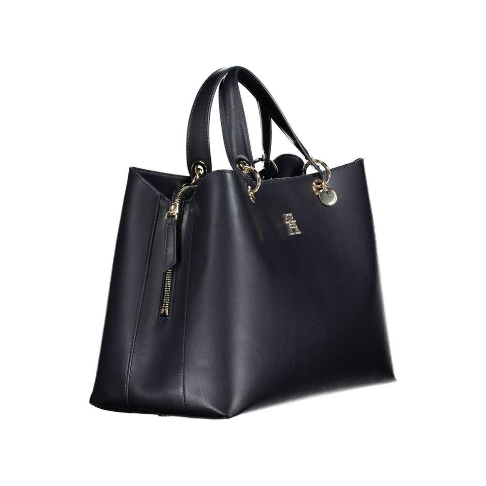 Tommy Hilfiger blue polyethylene women's handbag with two removable handles and spacious compartments, featuring a sleek design.