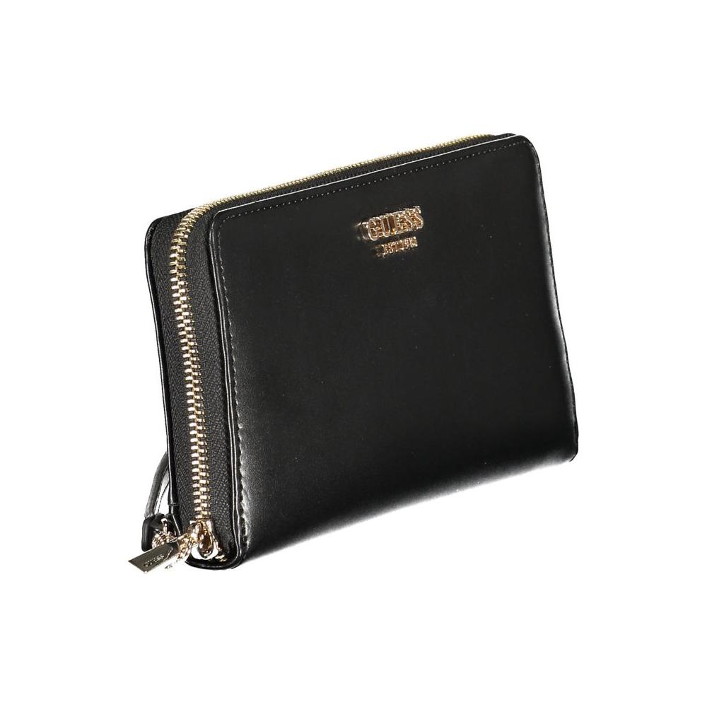 Guess Jeans black polyethylene wallet with two compartments, coin purse, card spaces, and zip closure. Logo embossed on front.
