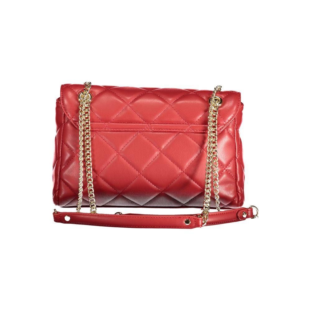 Valentino red polyethylene handbag with chain shoulder handles, internal pockets, contrasting details, zip and snap closure.