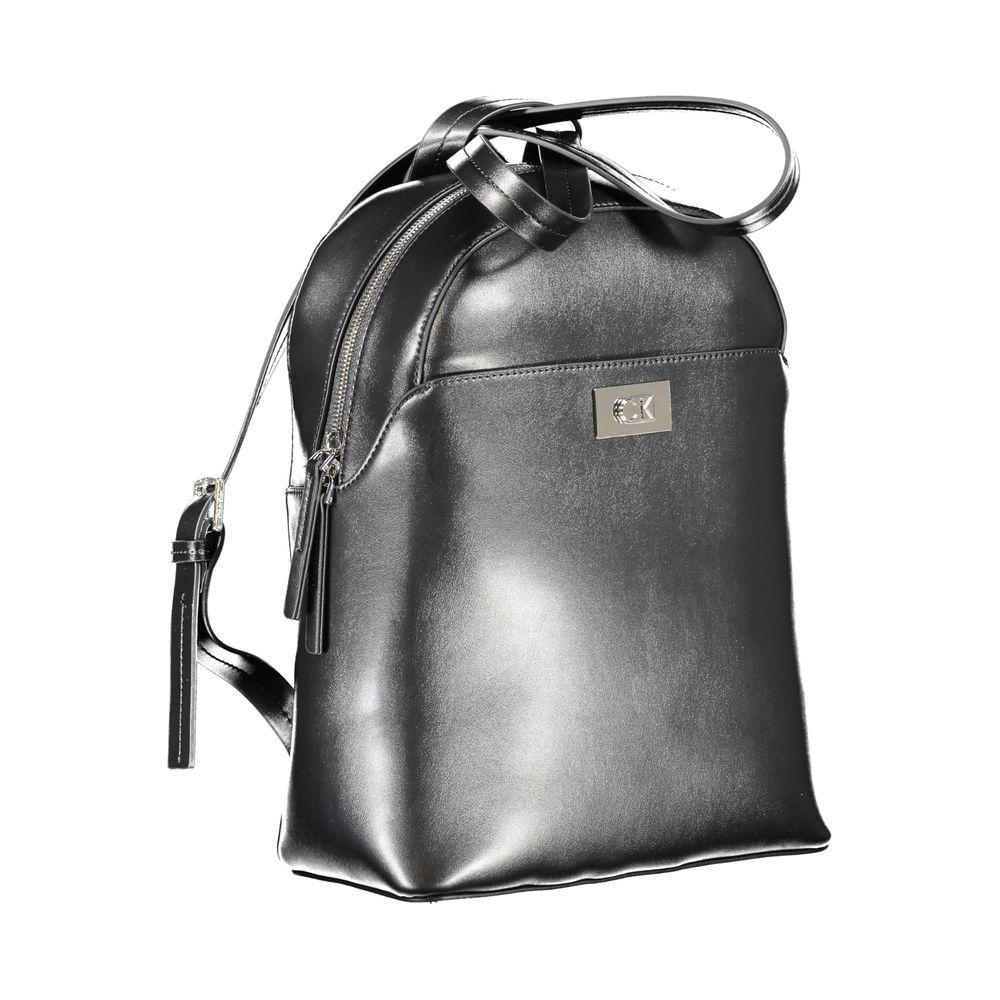 Calvin Klein black polyester backpack with handle, adjustable straps, external and internal pockets, zip closure, and logo.