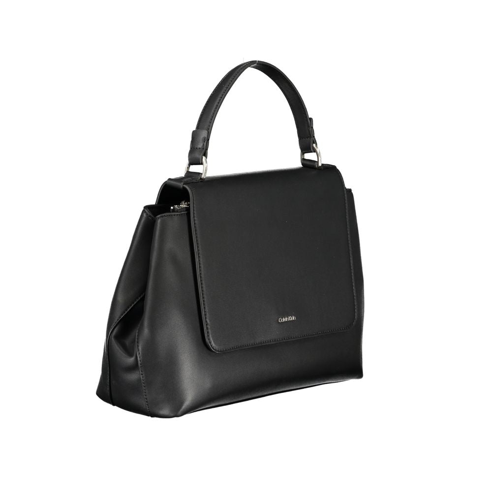 Calvin Klein black handbag with handle and adjustable strap, featuring internal pockets, zip closure, 50% recycled polyester material.